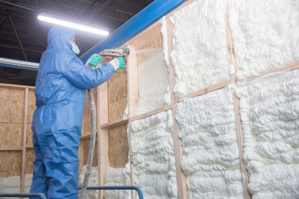 Key Benefits of Spray Foam Insulation Insulation of walls with spray foam